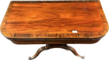 19th Century card table, the D shaped surface with flip top raised on four carved chambers and
