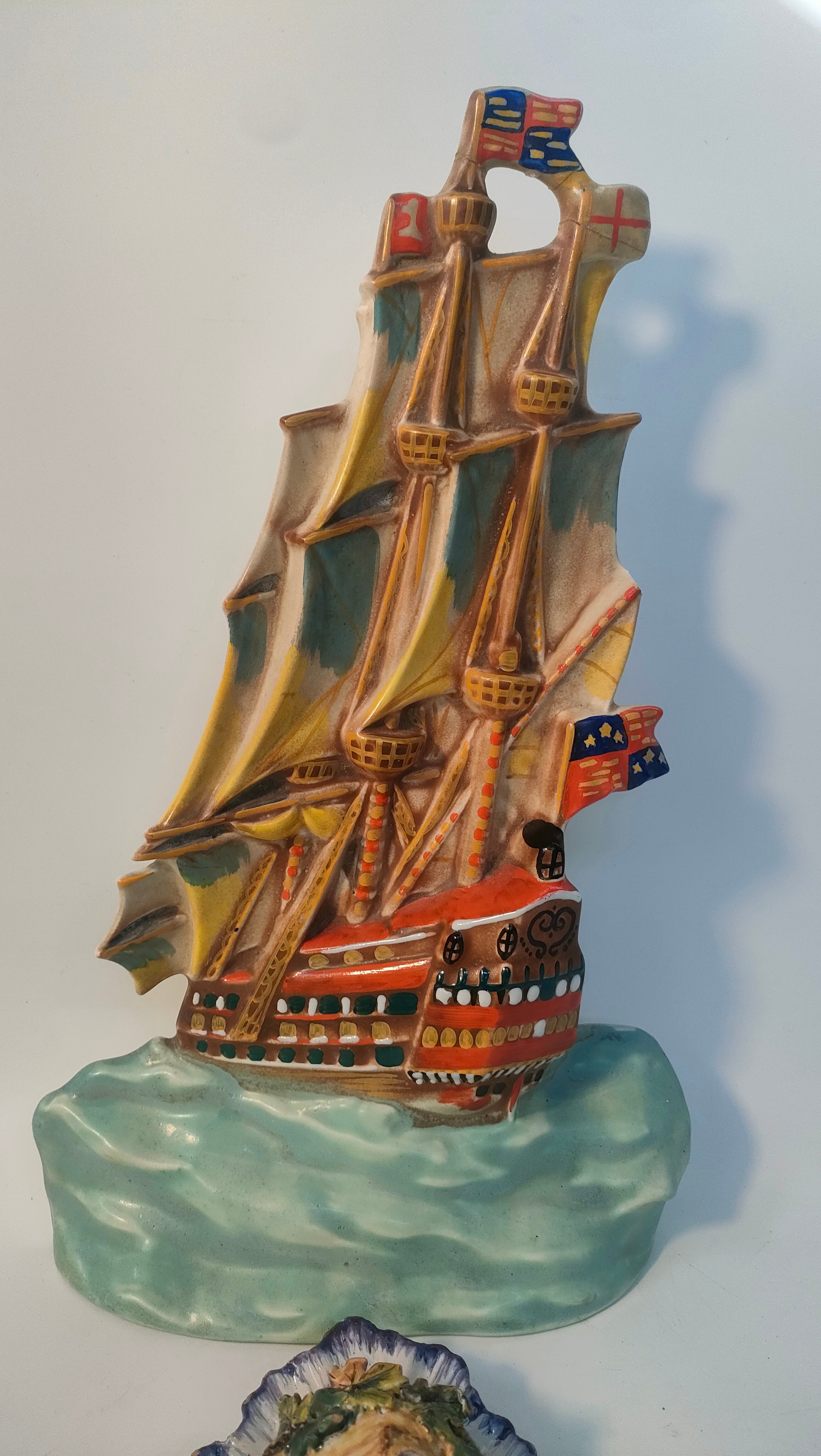 An Art Deco Ditmar Urbach of Czechoslovakia painted pottery wall plaque; modelled as a galleon along - Image 3 of 3