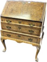 19th Century Walnut bureau the dropped front opening to the interior compartment, raised on cabriole