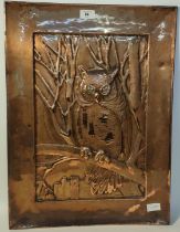 A 19th century copper wall plaque depicting a owl perched on a branch with castle scene [60x44.5cm]