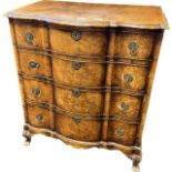 19th Century chest of drawers, the bow front shaped surface above four graduating drawers raised