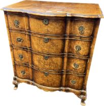 19th Century chest of drawers, the bow front shaped surface above four graduating drawers raised