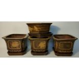 Collection of four Chinese drip glazed planters with resting plates