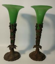 Pair of 19th century French green glass flutes eperines supported on cast metal stands [37.5cm]