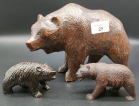Collection of three black forest wooden carved bear figures