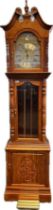 Reproduction grandfather clock within a rosewood case with scroll and pillar detail