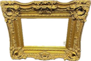 Antique moulded gilt framed mirror with foliate design [69x57cm]