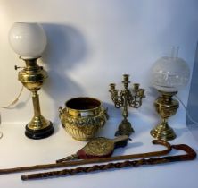 A Selection of brass; antique oil lamp converted, four brach brass candleabra, brass planter along