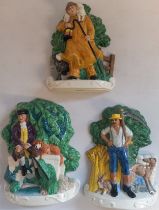 Three Mason's figures of character's in hunting scenes.