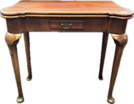 19th Century flip top games console table raised on turned tapered legs ending in pad feet. [71.5