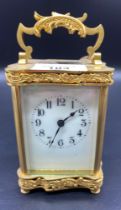 19th century French Brass Carriage clock with enamel face with clock key [8x11x6cm]