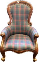 Reproduction mahogany scroll framed chair, covered in a tartan upholstery