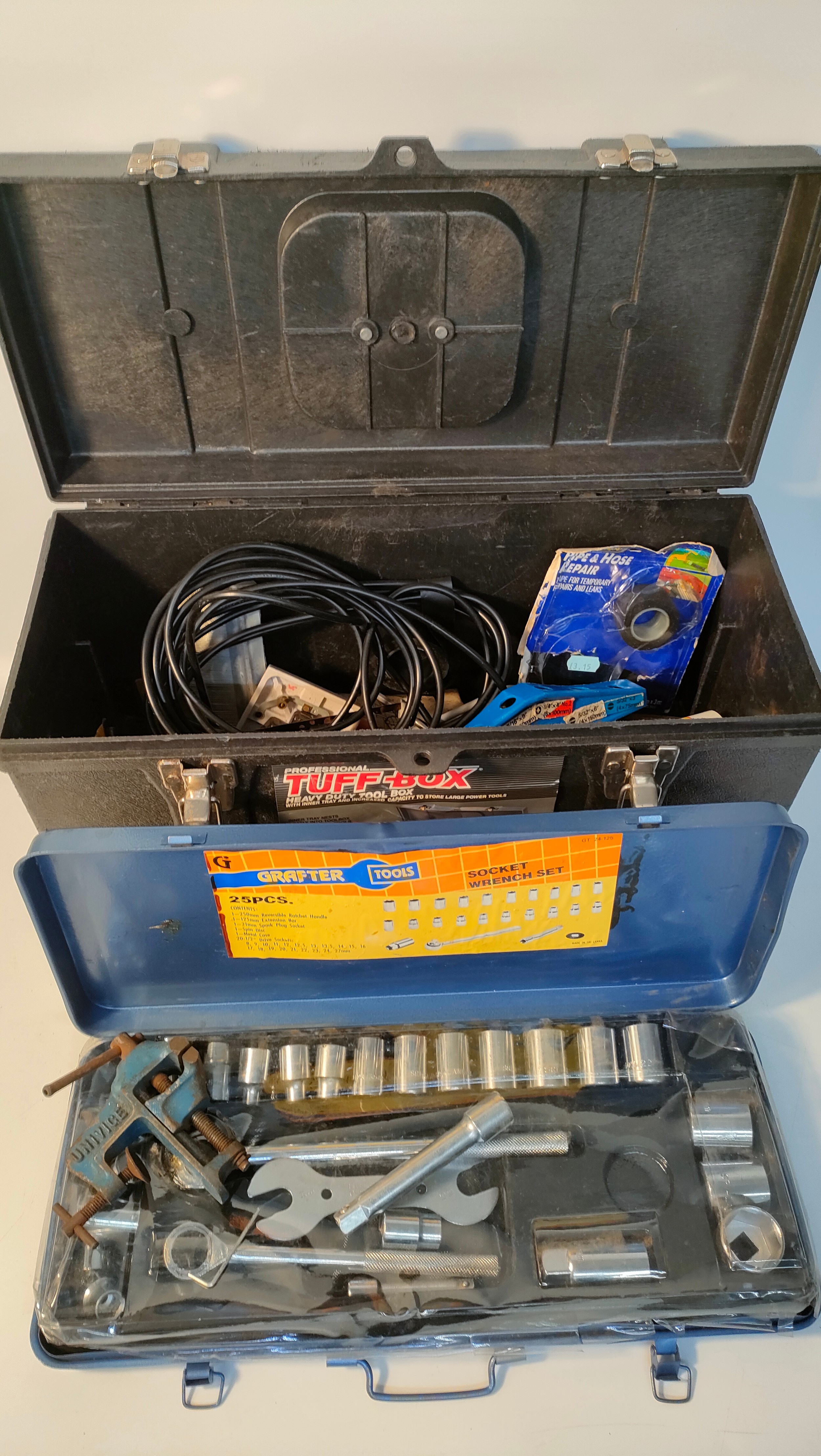 Tuff tool box with selection of tools.