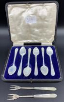 Set of six mother of pearl spoons in fitted case together with two silver ball marked [Birmingham]