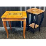 Marquetry veneered lift up musical table together with a blackened plant stand with floral design