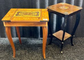 Marquetry veneered lift up musical table together with a blackened plant stand with floral design