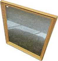 Antique style bevel edge mirror within a gilt foliate frame
