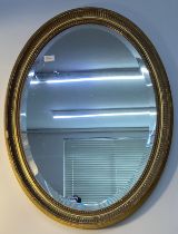 20th century oval gilt framed mirror [79x59cm]