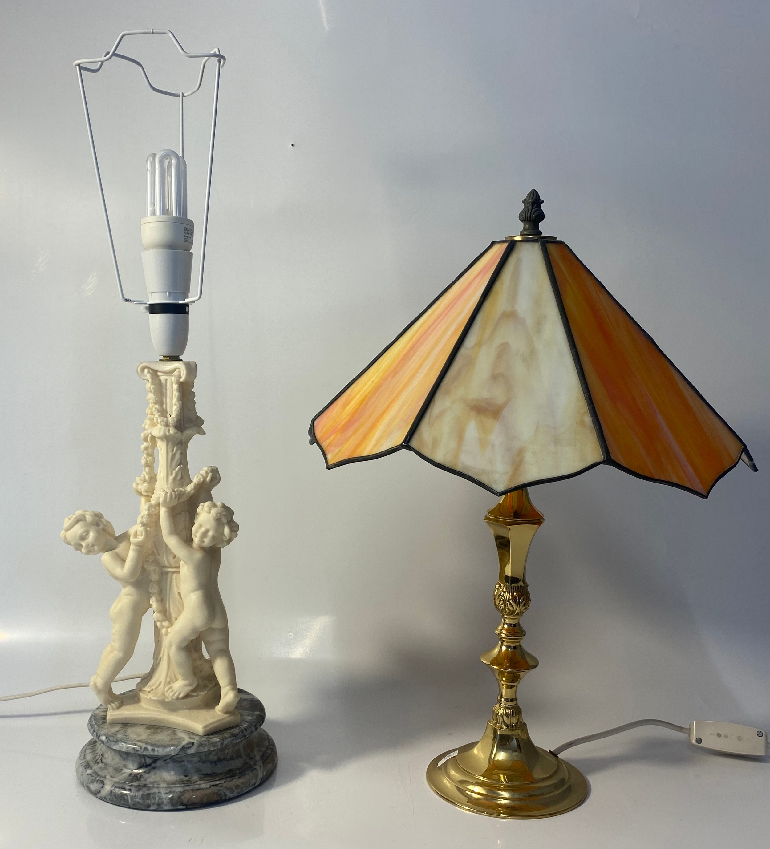 Figural cherub table lamp on marble Plinth together with brass table lamp