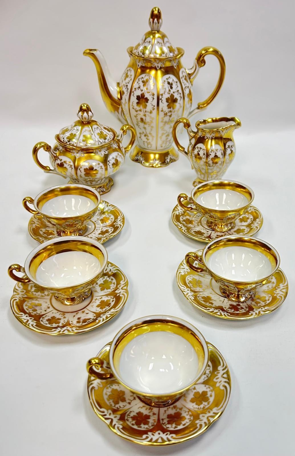 Schlaggenwald Czechoslovakian tea set with teapot, sugar and cream in a gilt design