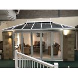 Large Display Conservatory with white Bi-folding Doors and conservatory roof (not including Furnitur