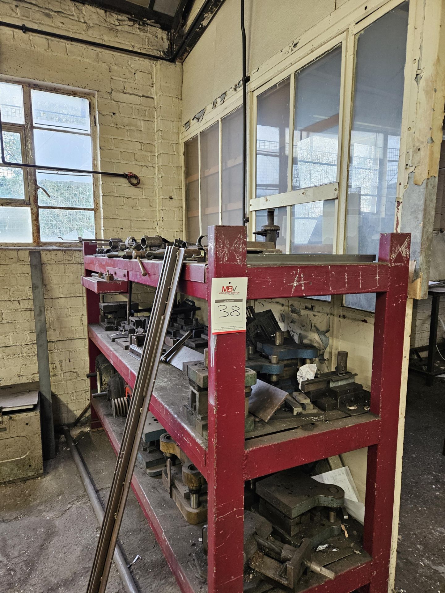 Assortment Of Press Spare Parts And Shelving Unit