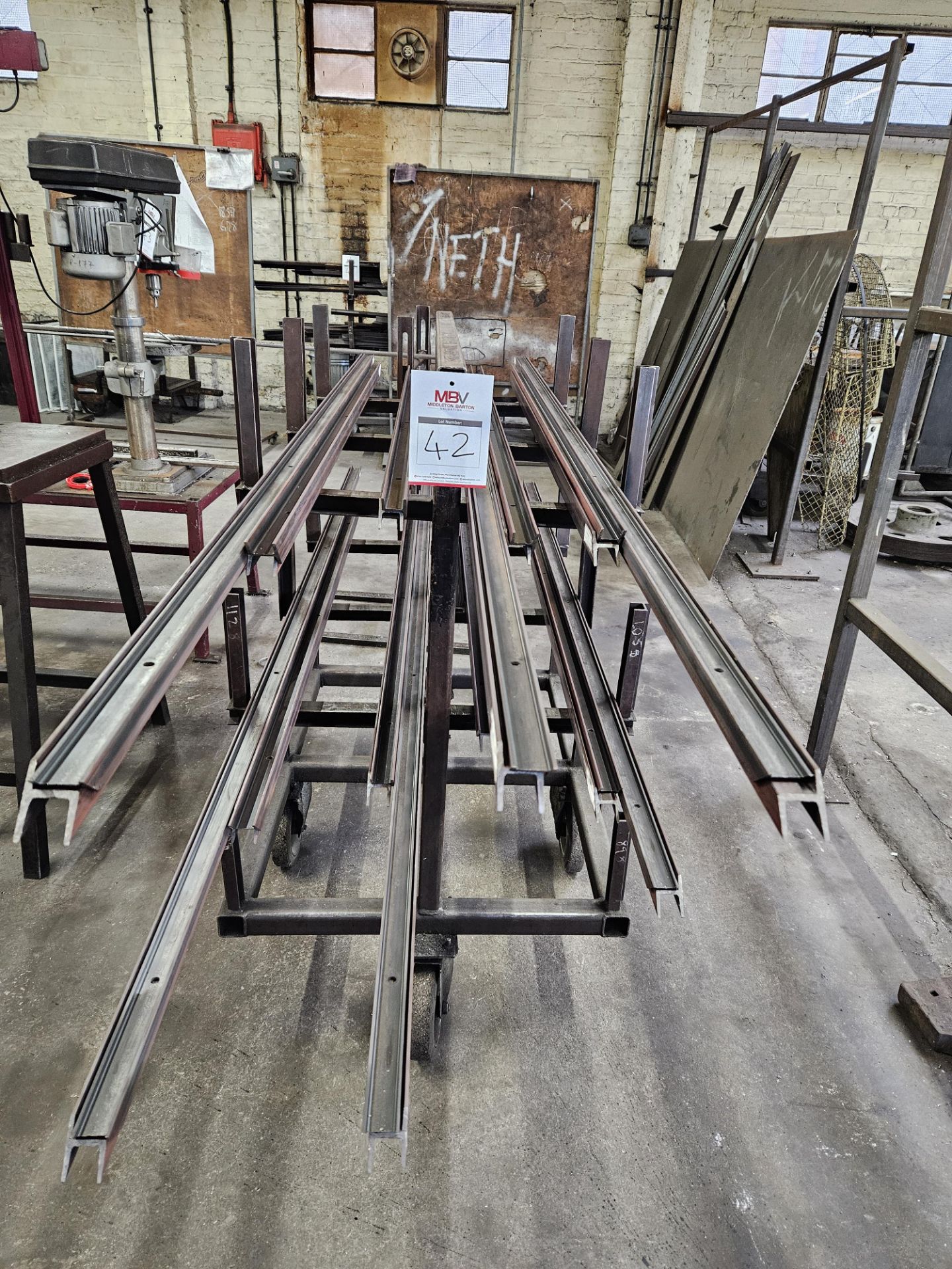 Assortment Of Steel Frame Cuts And Trolley