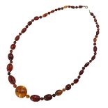 Necklace with faceted amber beads
