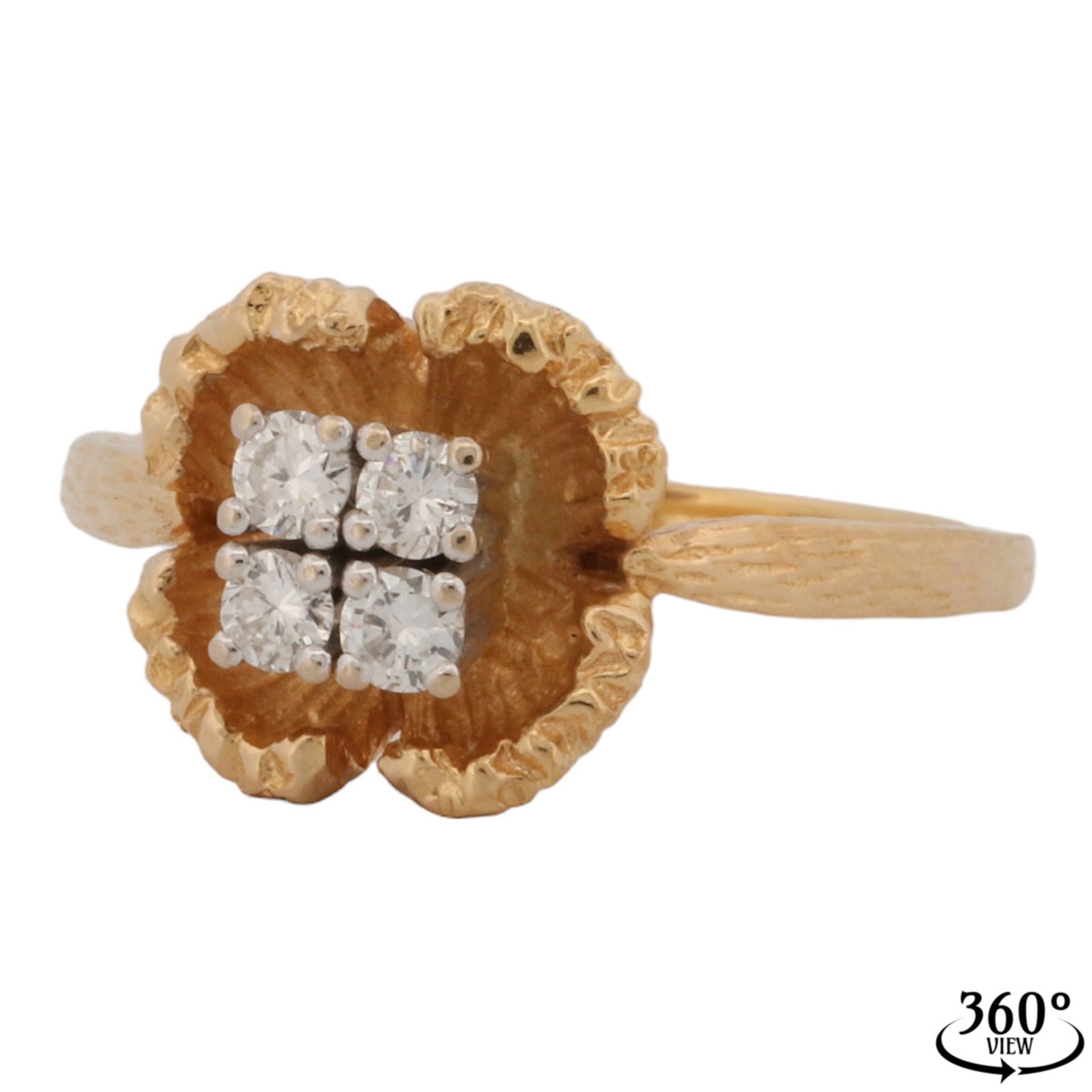 Floral brilliant ring in strong yellow gold