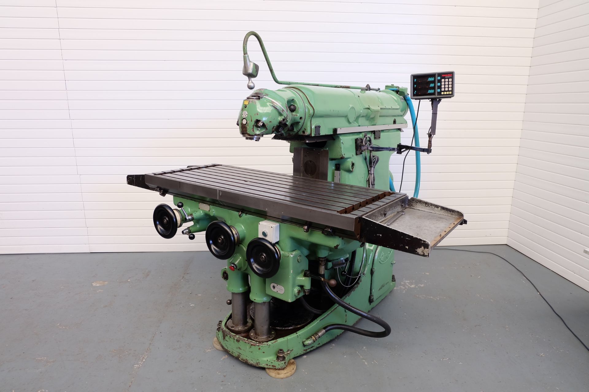 Huron KU55 Universal Mill. Table Size 64 3/8" x 26". Spindle Taper 40 ISO. Spindle Speeds 30 - 2066r
