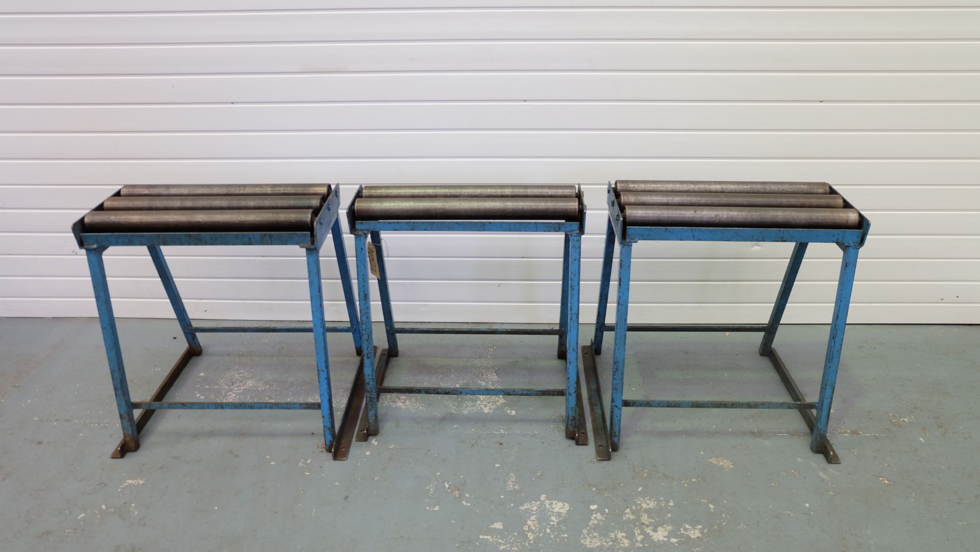 Three Roller Stands. Width of Rollers: 24". Height of Rollers: 28 3/4".