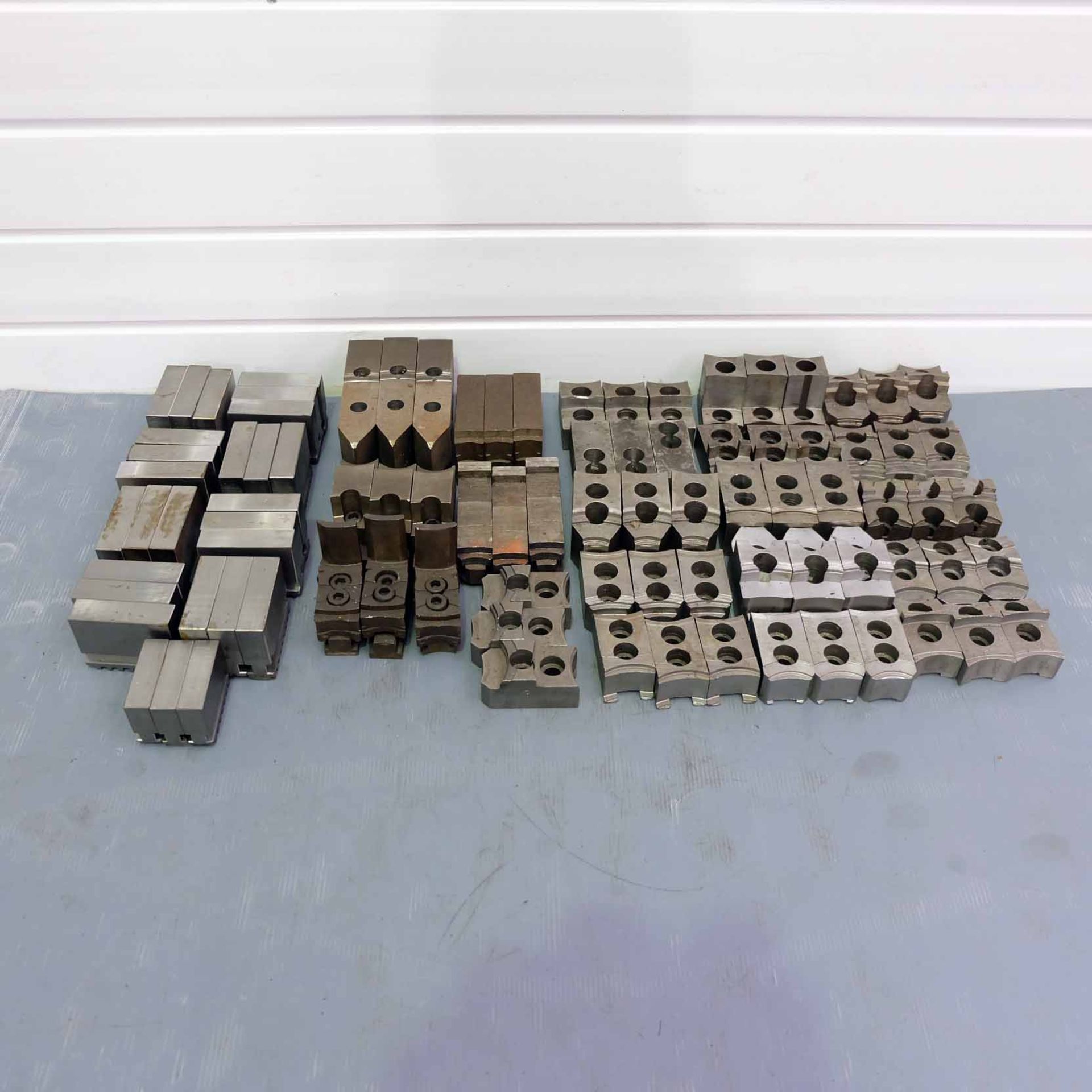 Quantity of Serrated & Scroll Type Soft Jaws. Various Shapes & Sizes.