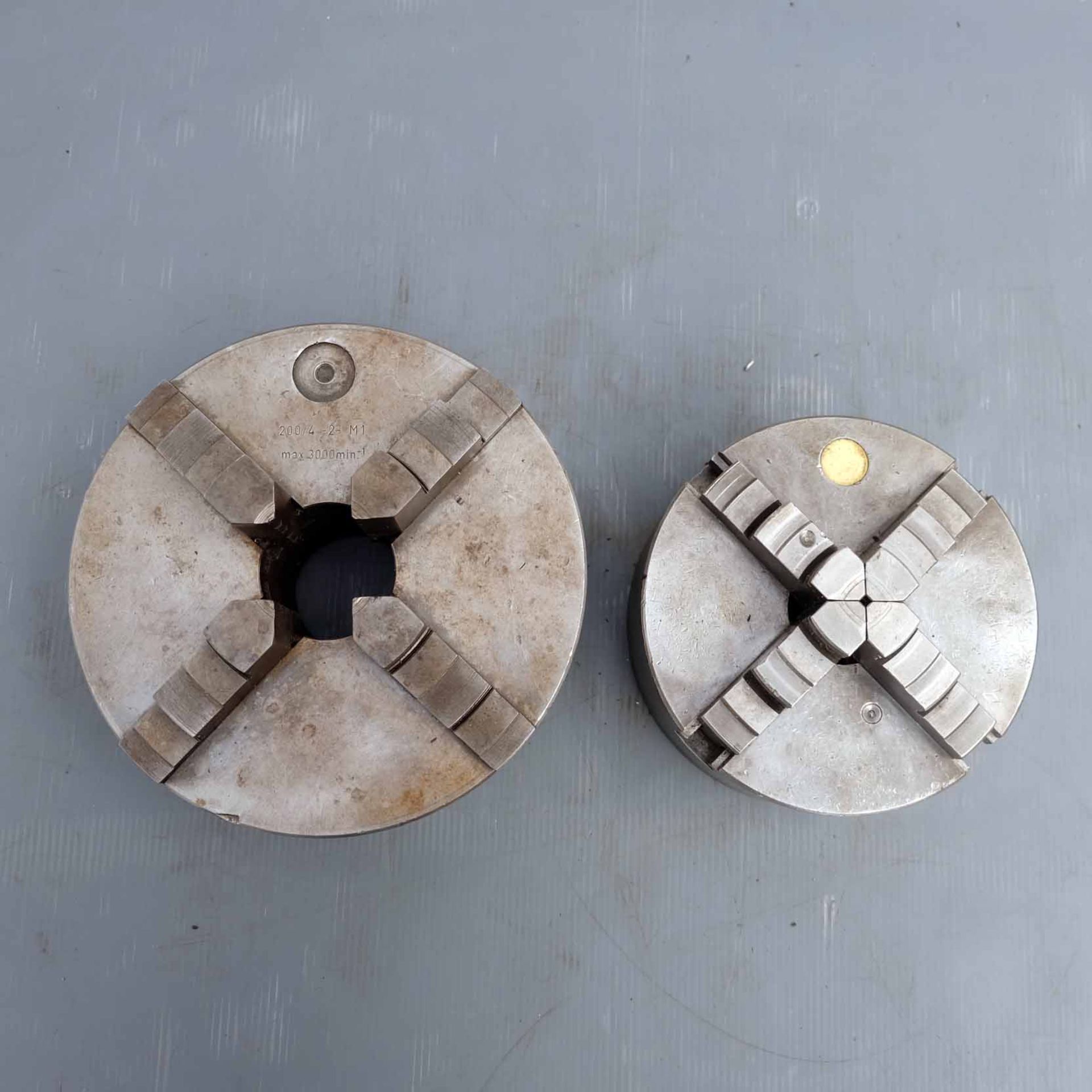 Two Self Centring 4 Jaw Scroll Chucks. Sizes 200mm & 160mm Diameter.