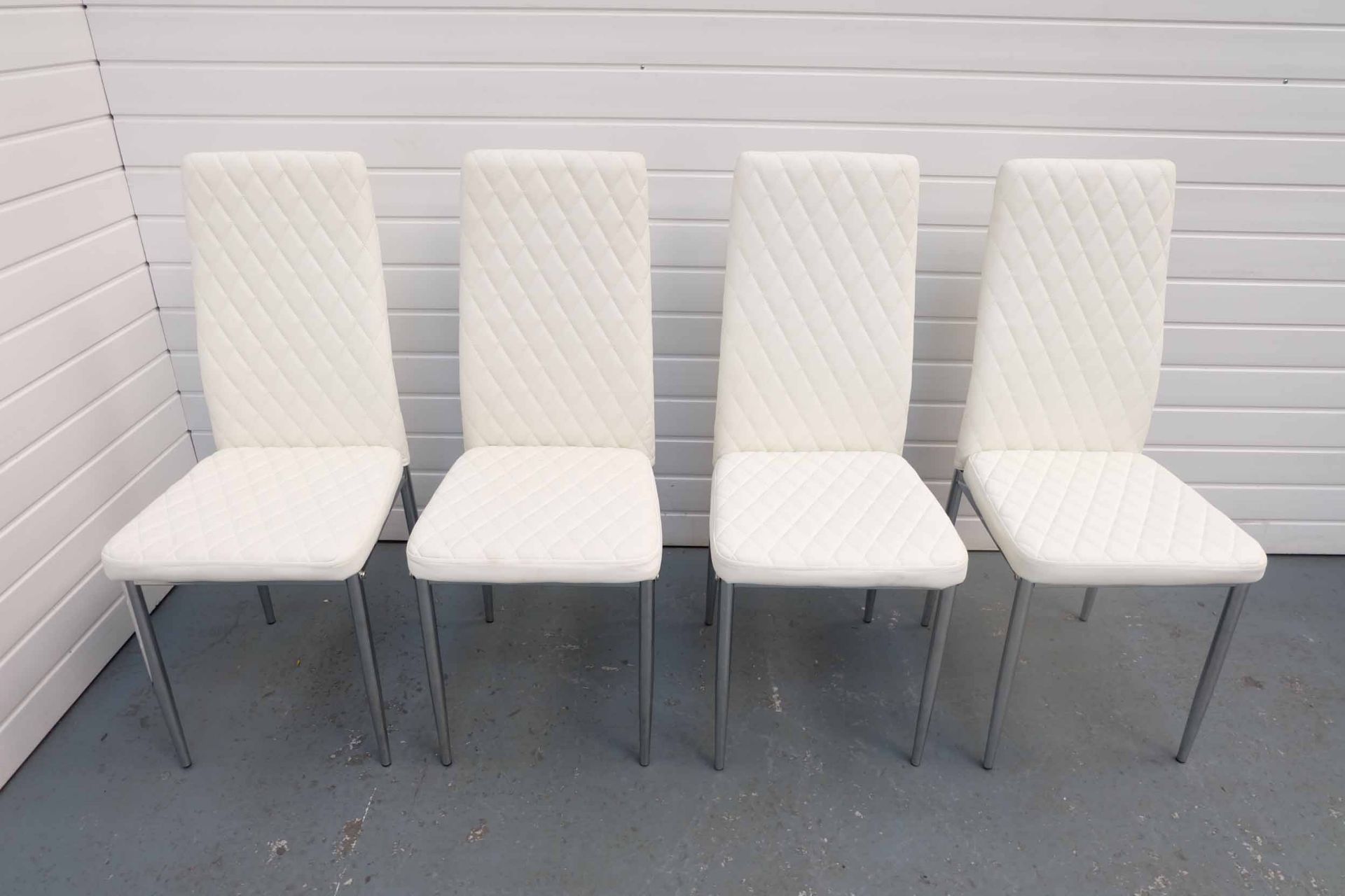 Set of 4 White Faux Leather High Back Dining Chairs.