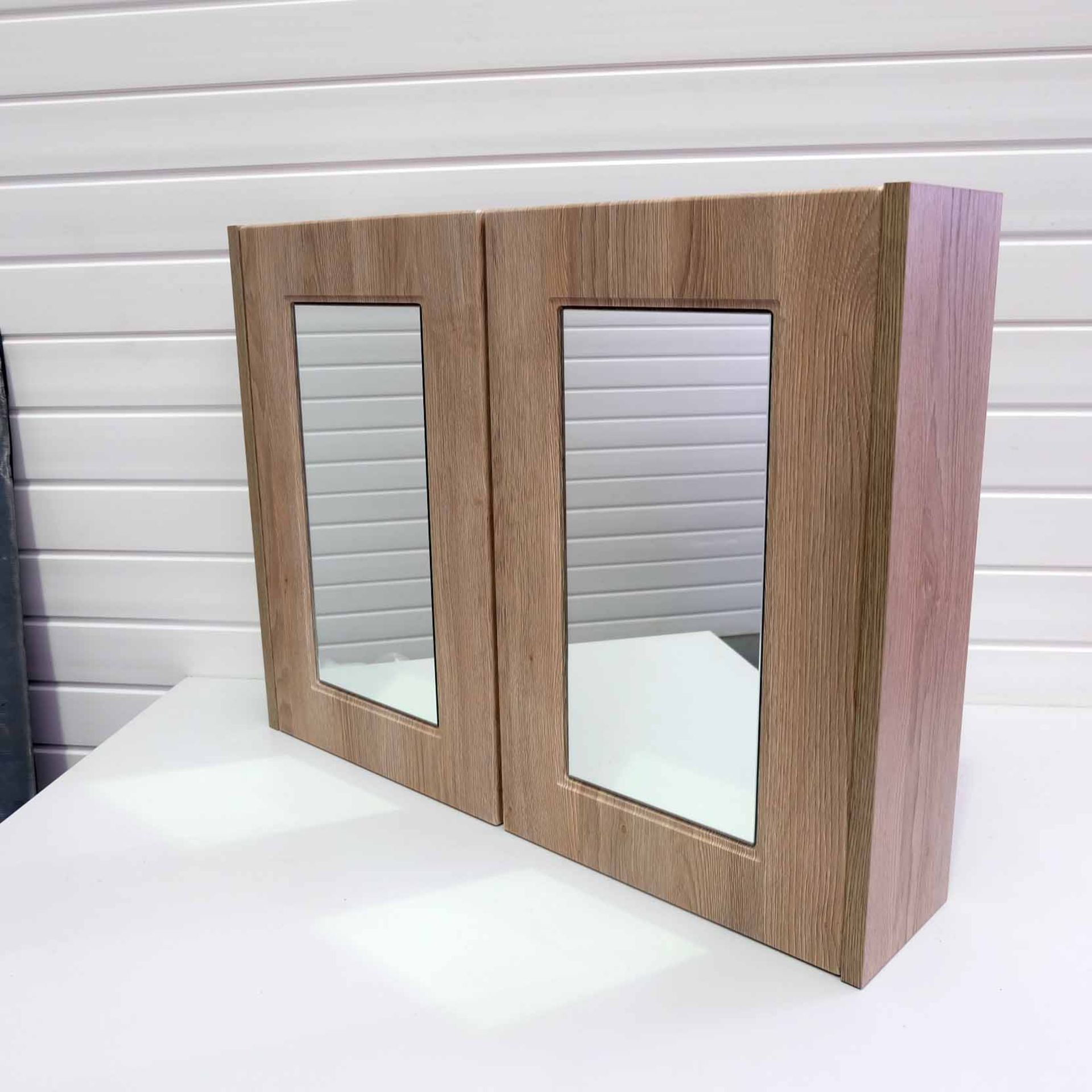 Mirrored Two Door Cabinet. With 1 x Shelf & 2 Handles. Size 790mm W x 162mm D x 597mm H.