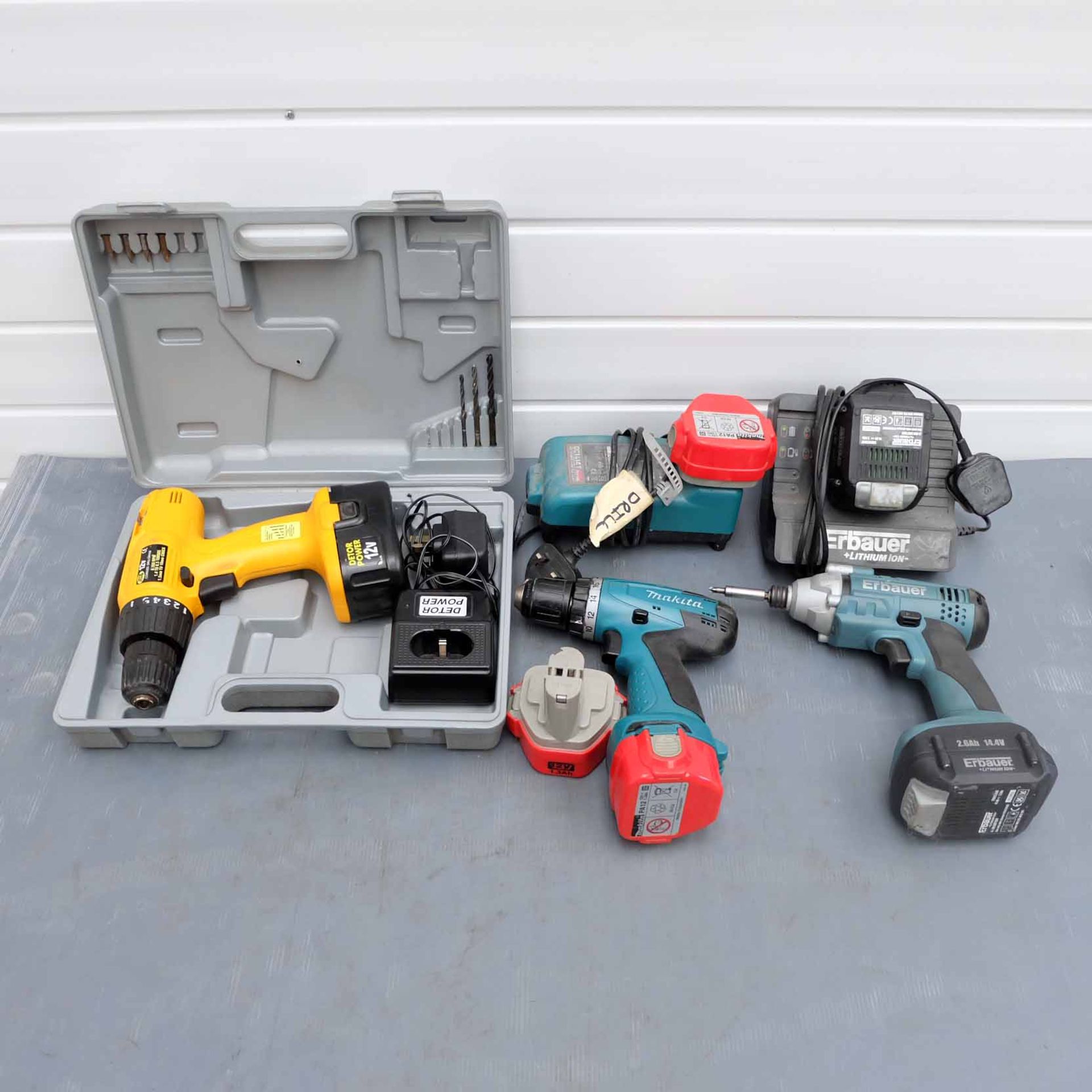 Quantity of 3 Drills. Includes Erbauer Drill With Charger & 2 Batteries (Working). Makita Drill With