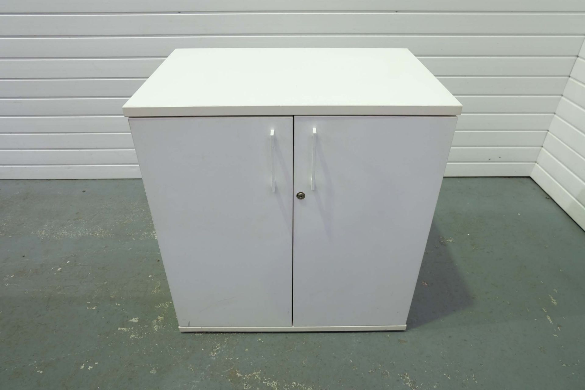 White Two Door Cupboard With Adjustable Shelf. Size 800mm x 525mm x 850mm High.