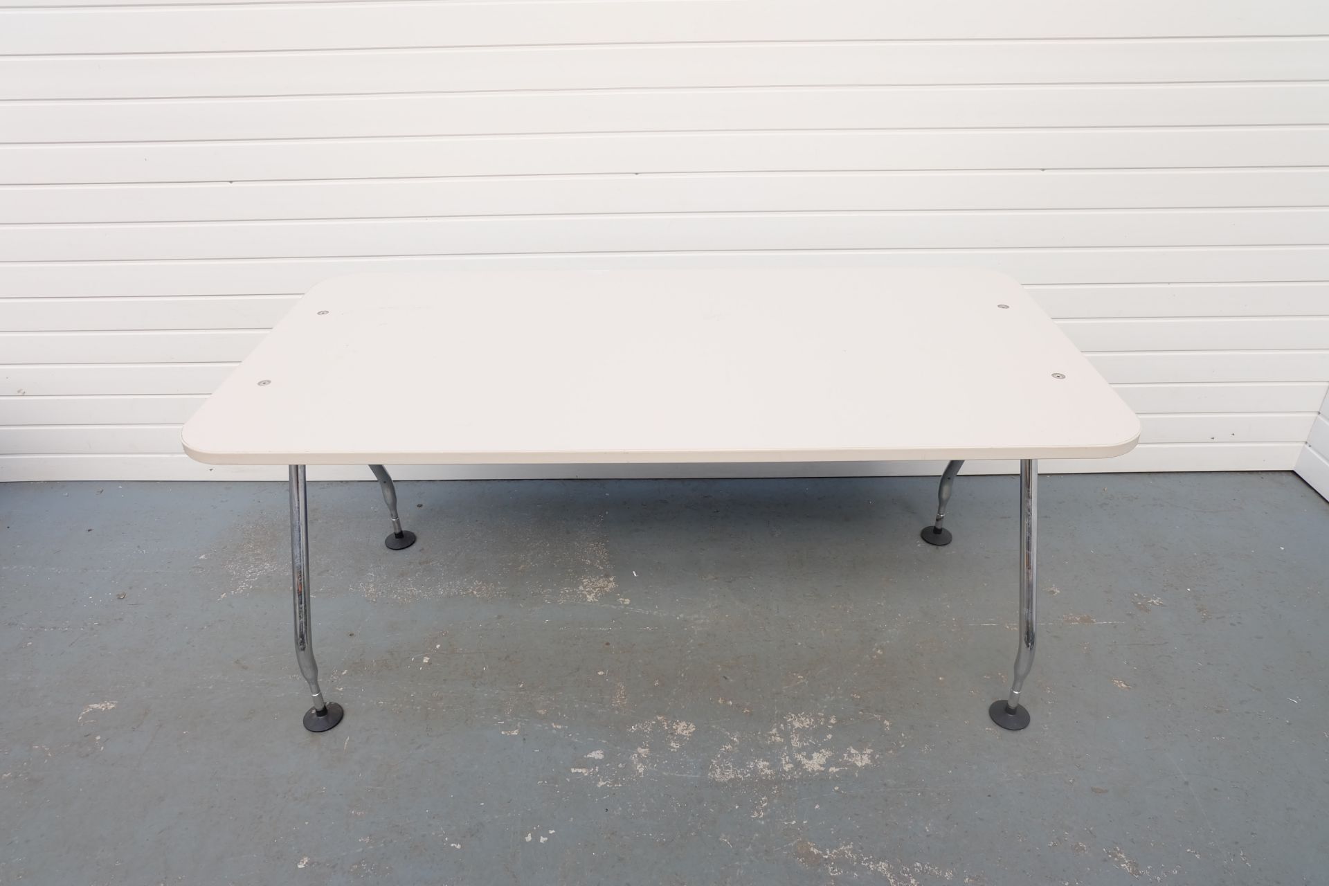 Chrome Legged Table With Adjustable Feet. Size 1600mm x 800mm x 720mm High.