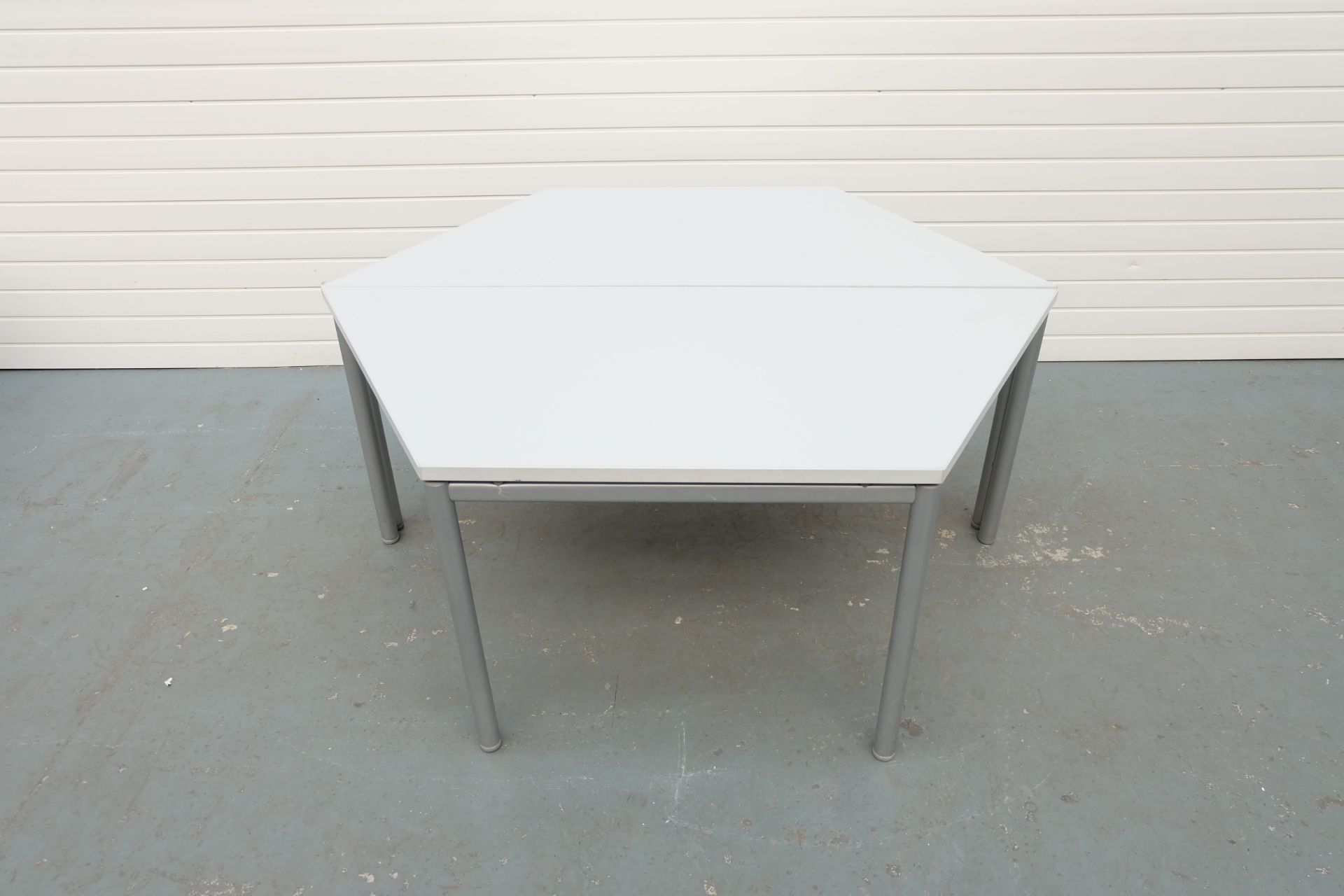 Two Part Hexagonal Table With Adjustable Feet. Size 1600mmx 690mm x 680mm High.