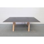 Black Top Desk With Wooden Legs. Size 2000mm x 1000mm x 745mm High.
