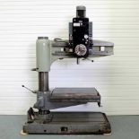 Q&S R4 Radial Arm Drill. Arm Radius 4'. Spindle Size 4MT. Table Size 35 3/4" x 21". Spindle Speeds 6