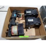 Assorted motors and gearboxes.
