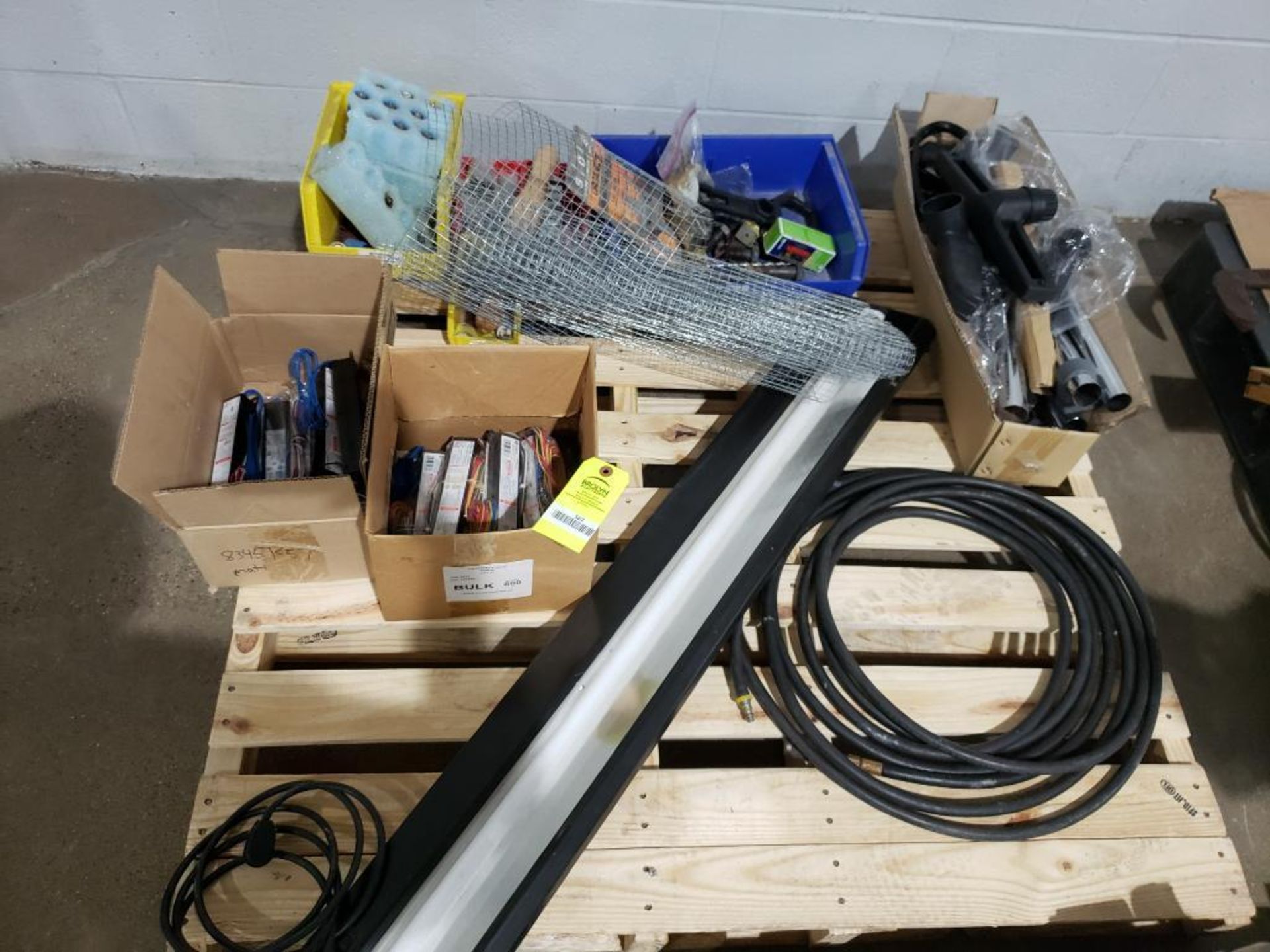 Pallet of assorted parts and hardware.