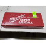 Milwauke super sawzall with metal case. Model 6527.