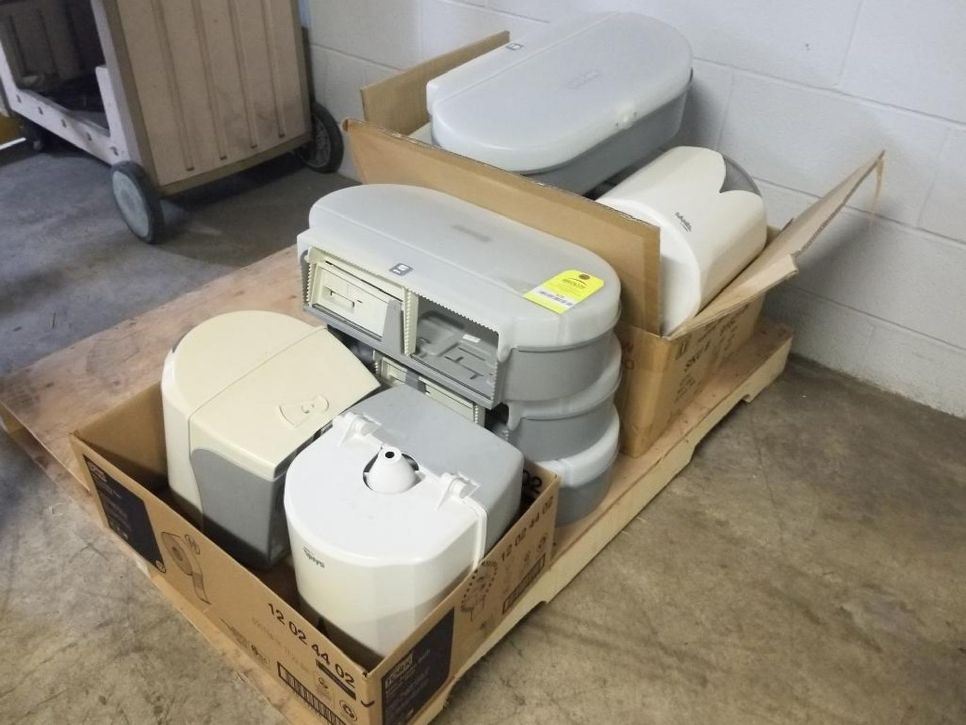 Large assortment of tissue dispensers.