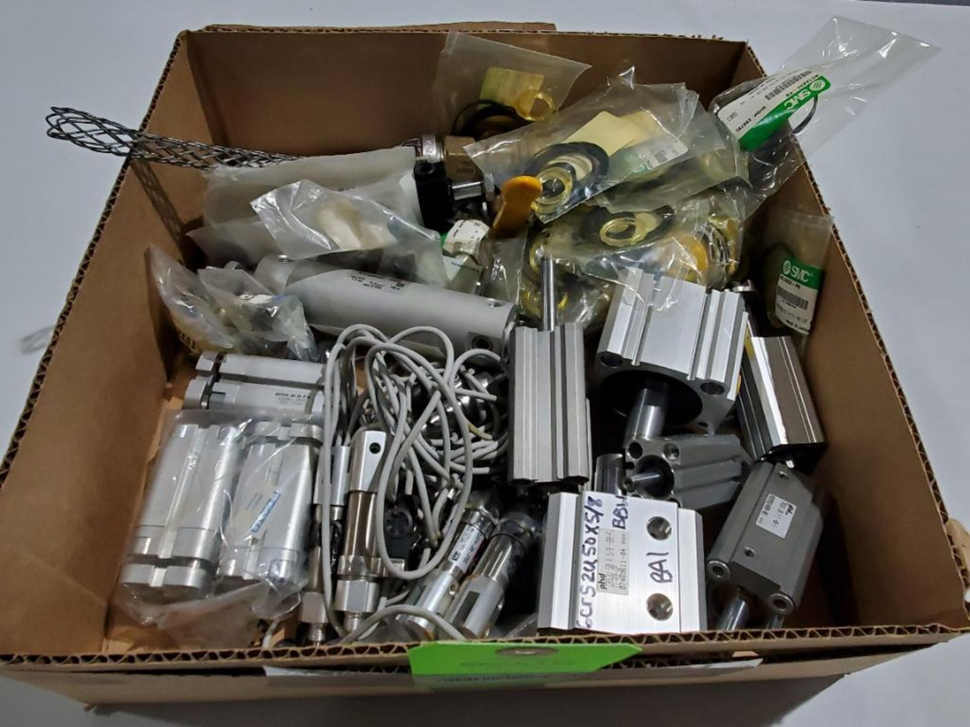 Assorted pneumatic and other machine parts.