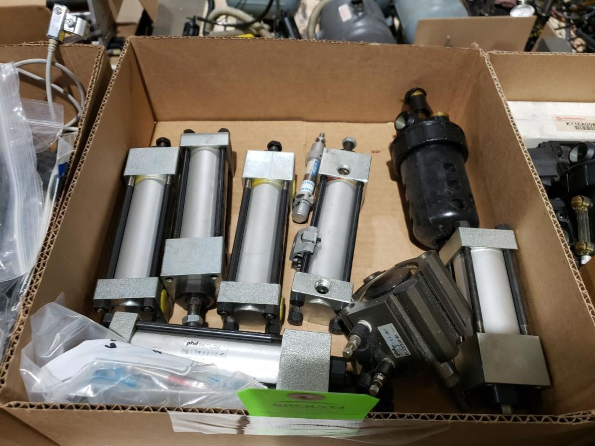 Assorted pneumatic cylinders.