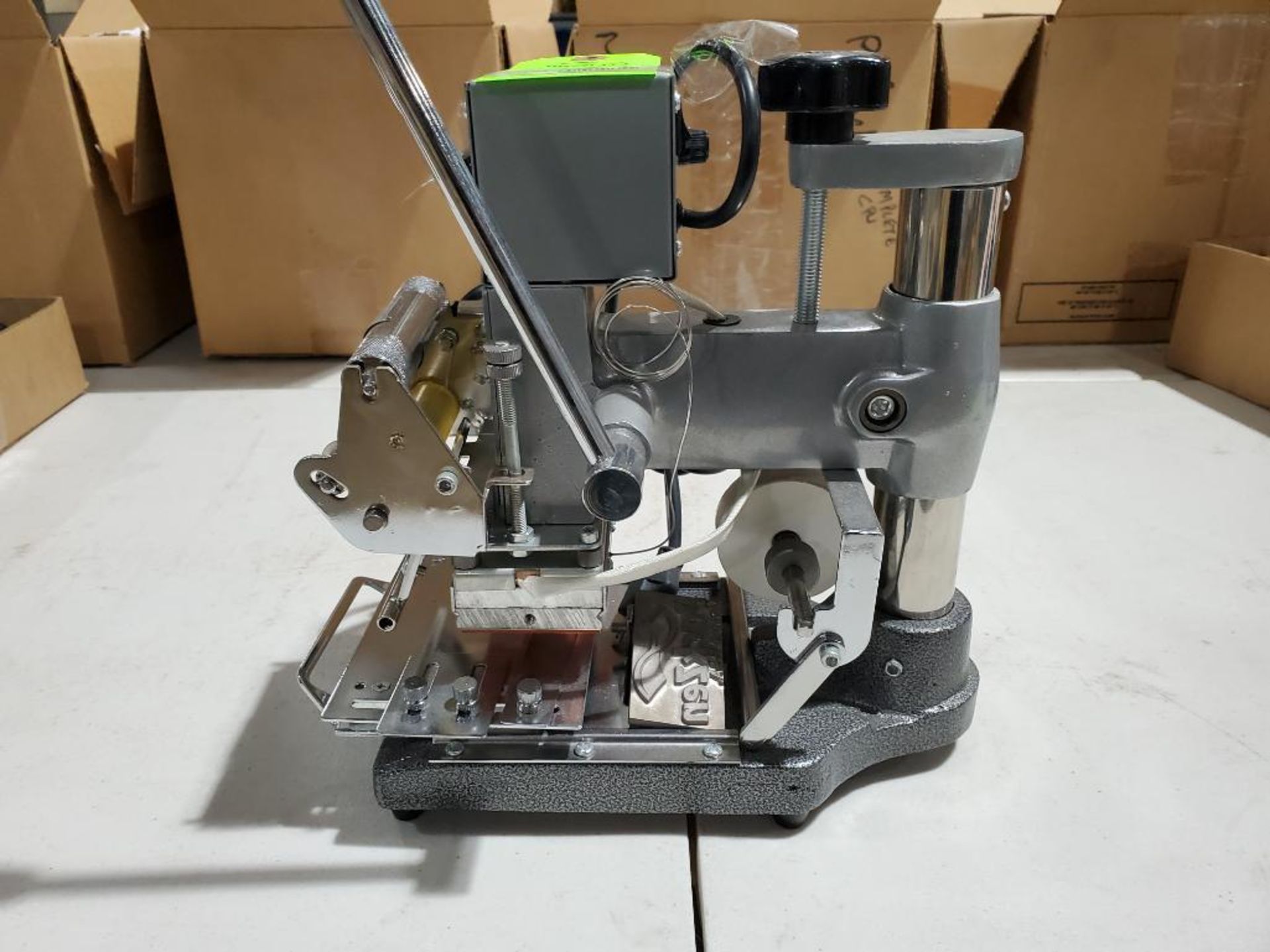 Silver hot foil stamping machine. Part number TJ-90A.