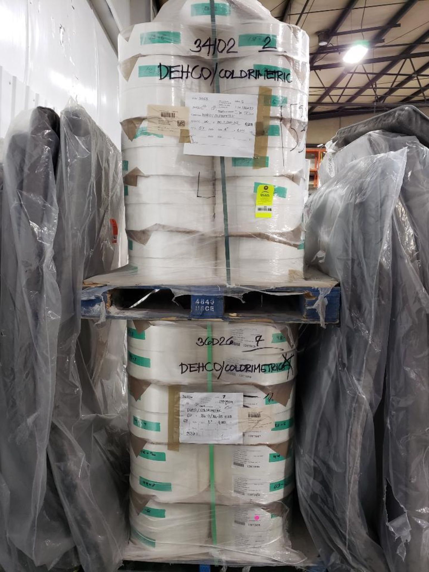 Qty 2 - Pallets of backer paper. Large qty of rolls. Could be used for packing material.