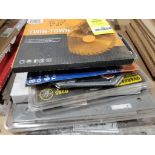Large assortment of saw blades.